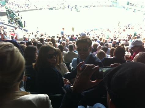 wimbleton watchers in stands.